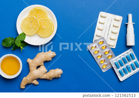 Natural cold and flu home remedies. Natural ingredients for immunity stimulation and viruses protection. top view flat lay Natural cold and flu home remedies. Natural ingredients for immunity stimulation and viruses protection. top view flat lay 121562513