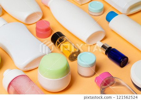Group of plastic bodycare bottle Flat lay composition with cosmetic products on colored background empty space for you design. Set of White Cosmetic containers, top view with copy space 121562524