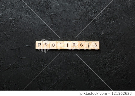 Psoriasis word written on wood block. Psoriasis text on table, concept Psoriasis word written on wood block. Psoriasis text on table, concept 121562623