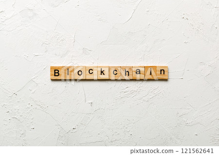 BLOCKCHAIN word written on wood block. BLOCKCHAIN text on table, concept 121562641