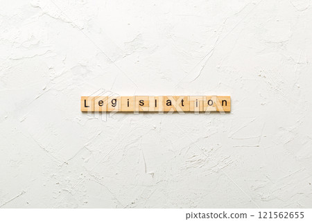 legislation word written on wood block. legislation text on table, concept 121562655