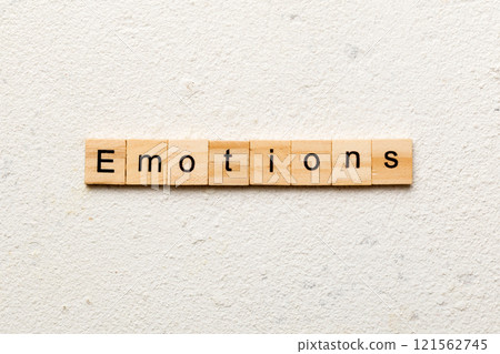 EMOTIONS word written on wood block. EMOTIONS text on cement table for your desing, concept EMOTIONS word written on wood block. EMOTIONS text on cement table for your desing, concept 121562745