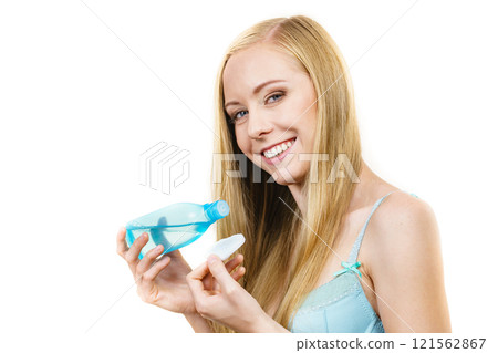 Woman using cleanser cosmetic Woman using cleanser cosmetic 121562867