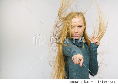 Woman pointing and shaking her finger Woman pointing and shaking her finger 121562885