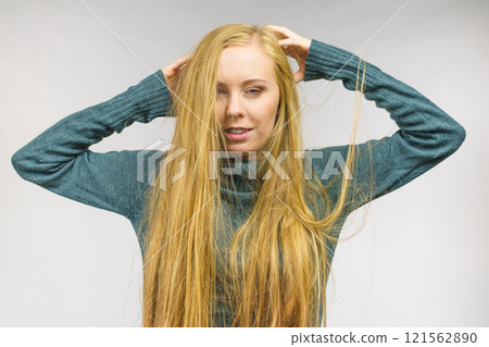 Girl with blonde long hair Girl with blonde long hair 121562890