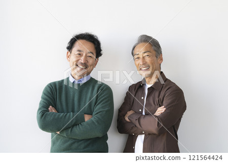 Two senior men smiling at the camera Two senior men smiling at the camera 121564424