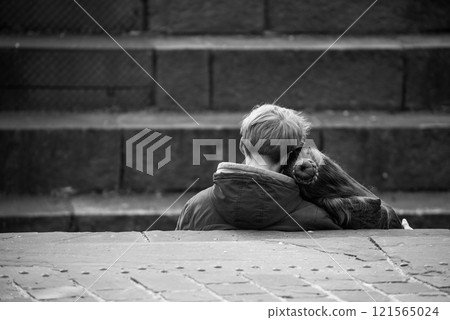 portrait on back view of young couple sitting in the street on black and white photography portrait on back view of young couple sitting in the street on black and white photography 121565024