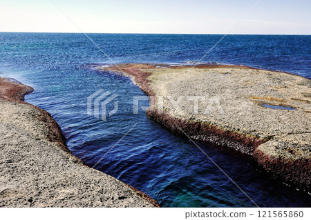 Rocky shore of the Caspian Sea. 121565860