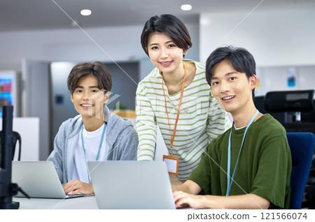 Young IT engineers having a meeting in the office Young IT engineers having a meeting in the office 121566074