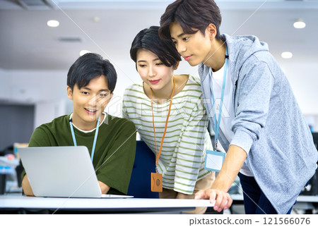 Young IT engineers having a meeting in the office Young IT engineers having a meeting in the office 121566076