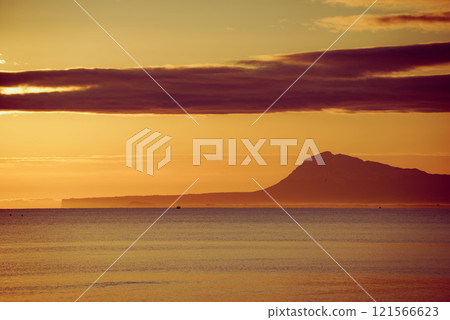 Sunrise over sea 121566623