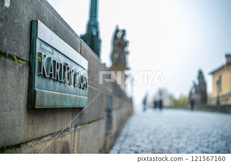 Bronze Sign On Charles Bridge: Gateway To Prague's Most Exciting Sights 121567160