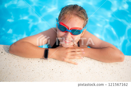 Little Girl Smiling And Swimming In The Pool, Training 121567162