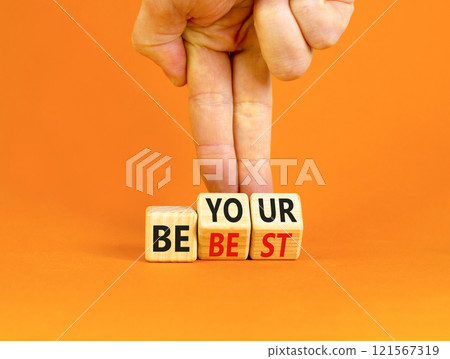 Motivational be your best symbol. Concept words Be your best on beautiful wooden block. Beautiful orange background Businessman hand. Business motivational be your best concept. Copy space. 121567319
