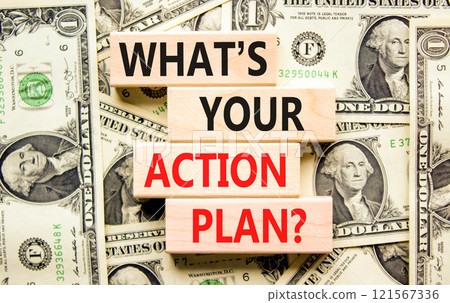 Action plan symbol. Concept words What is your action plan on beautiful wooden blocks. Dollar bills. Beautiful background from dollar bills. Business What is your action plan concept. Copy space 121567336