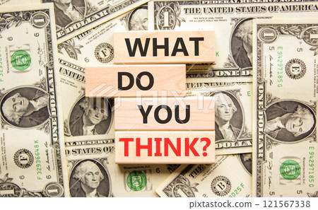 What do you think symbol. Concept words What do you think on beautiful wooden blocks. Dollar bills. Beautiful background from dollar bills. Business and What do you think concept. Copy space. 121567338
