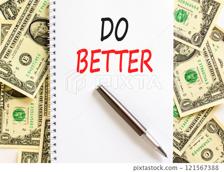 Do better symbol. Concept words Do better on beautiful white note. Beautiful background from dollar bills. Black pen. Business and do better concept. Copy space. Do better symbol. Concept words Do better on beautiful white note. Beautiful background from dollar bills. Black pen. Business and do better concept. Copy space. 121567388