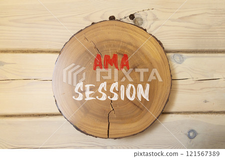 AMA ask me anything session symbol. Concept words AMA ask me anything session on beautiful wooden circle. Beautiful wooden wall background. Business and AMA ask me anything session concept. Copy space 121567389