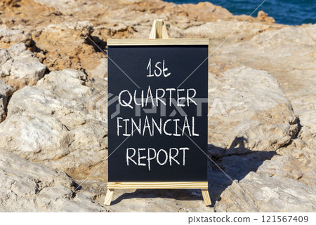 1st quarter financial report symbol. Concept words 1st quarter financial report on beautiful black blackboard. Beautiful stone background. Business 1st quarter financial report concept. Copy space. 121567409