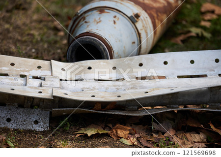 The tail section of a 220 mm rocket for the Uragan rocket fire system on a city flowerbed in Mykolaiv 121569698