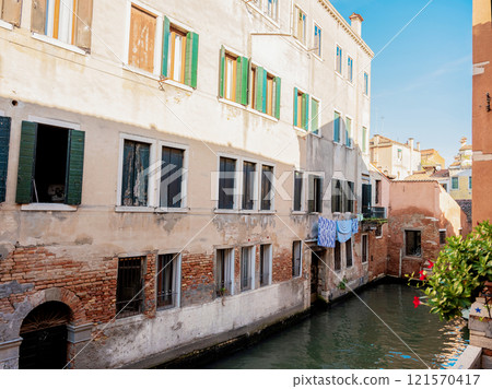 not most popular tourist spot Venice. outskirts city. canals, houses and bridges 121570417