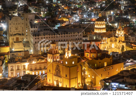 Guanajuato City, Mexico, aerial view of historical buildings in evening twilight. Close up of Templo de San Felipe Neri 121571407