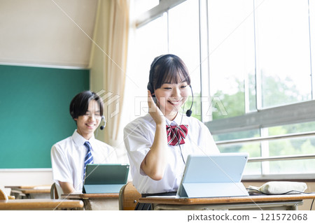 Online English conversation lessons classrooms boys and girls high school junior high school ICT 121572068