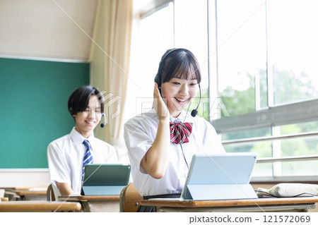 Online English conversation lessons classrooms boys and girls high school junior high school ICT 121572069