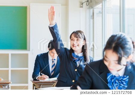 High school students wearing uniforms studying in the classroom 121572708