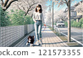 A woman walking with a dog 121573355