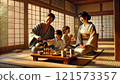 A family in yukata chatting at a ryokan 121573357