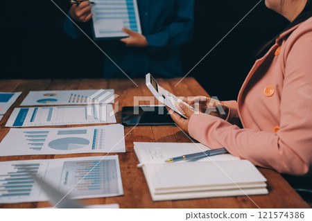 Business meetings to analyze investment strategies and brainstorm sales plans for a more profitable business. Business meetings to analyze investment strategies and brainstorm sales plans for a more profitable business. 121574386