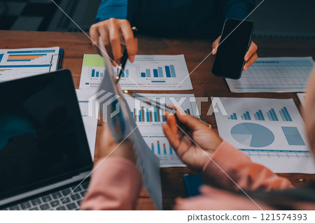 Business meetings to analyze investment strategies and brainstorm sales plans for a more profitable business. 121574393