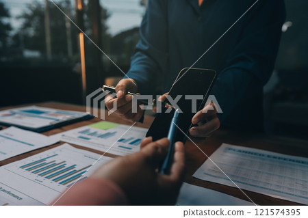 Business meetings to analyze investment strategies and brainstorm sales plans for a more profitable business. 121574395