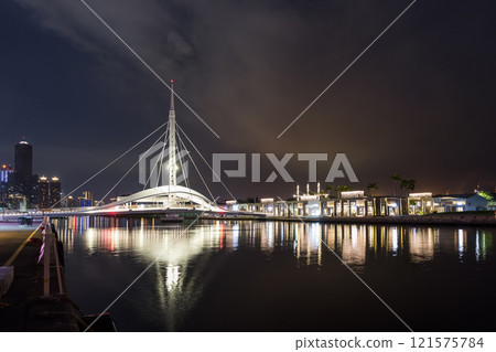 Night view of the beautiful Dagang Bridge (Great Harbor Bridge) connecting Pier-2 Art Center and Peng-lai Commercial Harbor in Kaohsiung, Taiwan. Night view of the beautiful Dagang Bridge (Great Harbor Bridge) connecting Pier-2 Art Center and Peng-lai Commercial Harbor in Kaohsiung, Taiwan. 121575784