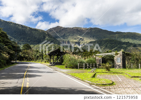 View of Yangjin Highway in Yangmingshan National Park, New Taipei City, Taiwan. There are beautiful natural landscapes along the road. 121575958