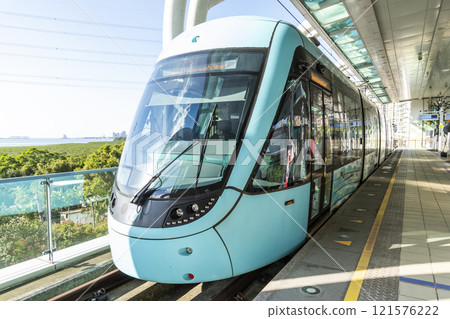 View of Danhai light rail transit (LRT) train at the Honasnuii station in New Taipei City, Taiwan. It is the first light rail transit in northern Taiwan. 121576222