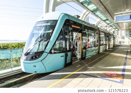 View of Danhai light rail transit (LRT) train at the Honasnuii station in New Taipei City, Taiwan. It is the first light rail transit in northern Taiwan. View of Danhai light rail transit (LRT) train at the Honasnuii station in New Taipei City, Taiwan. It is the first light rail transit in northern Taiwan. 121576223