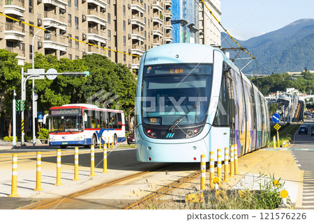 A train traveling on the Danhai Light Rail transit (LRT) in New Taipei City, Taiwan. 121576226