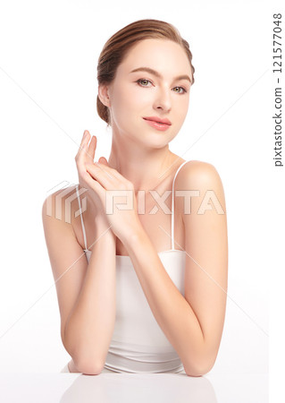 Beautiful young woman with clean fresh skin on white background, Face care, Facial treatment, Cosmetology, beauty and spa, women portrait. Beautiful young woman with clean fresh skin on white background, Face care, Facial treatment, Cosmetology, beauty and spa, women portrait. 121577048