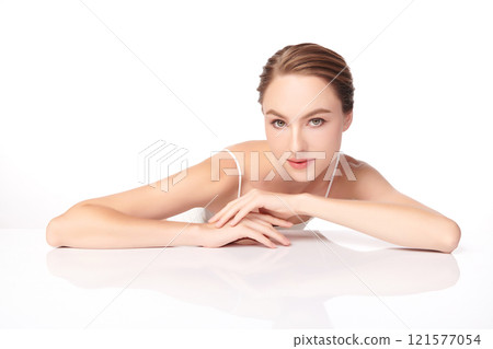Beautiful young woman with clean fresh skin on white background, Face care, Facial treatment, Cosmetology, beauty and spa, women portrait. Beautiful young woman with clean fresh skin on white background, Face care, Facial treatment, Cosmetology, beauty and spa, women portrait. 121577054