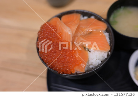 Bowl of rice topped with sashimi Bowl of rice topped with sashimi 121577126
