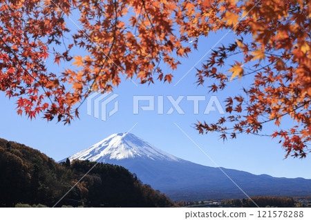 Mount Fuji and autumn leaves taken from the shores of Lake Kawaguchi Mount Fuji and autumn leaves taken from the shores of Lake Kawaguchi 121578288