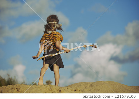 Cute baby dressed in the clothes of primitive people Cute baby dressed in the clothes of primitive people 121579106