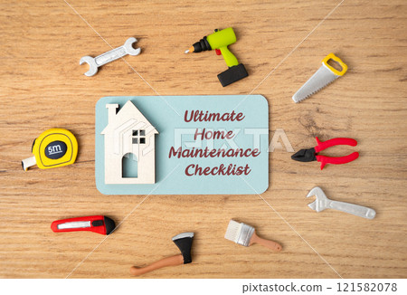 Ultimate home maintenance checklist concept. Tasks to keep your housing safe, efficient, and in good condition. Notes, house and repair tools are on the table Ultimate home maintenance checklist concept. Tasks to keep your housing safe, efficient, and in good condition. Notes, house and repair tools are on the table 121582078