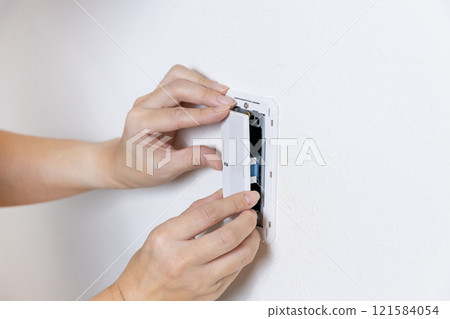 Installing new light switch handles 121584054