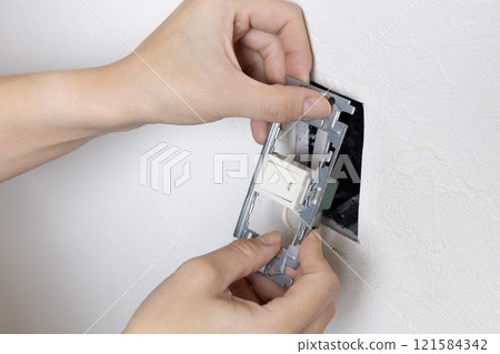 Removing the old light switch 121584342