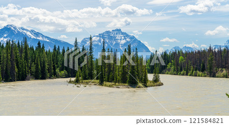 Jasper National Park Athabasca River summer landscape. Alberta, Canada. Canadian Rockies. Mount Kerkeslin and Mount Hardisty in the background. Jasper National Park Athabasca River summer landscape. Alberta, Canada. Canadian Rockies. Mount Kerkeslin and Mount Hardisty in the background. 121584821