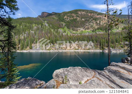 Horseshoe Lake in Jasper National Park, Alberta, Canada. Canadian Rockies summer landscape. Horseshoe Lake in Jasper National Park, Alberta, Canada. Canadian Rockies summer landscape. 121584841