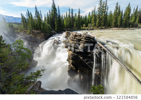 Athabasca Falls in Jasper National Park, Alberta, Canada. Canadian Rockies summer landscape. Athabasca Falls in Jasper National Park, Alberta, Canada. Canadian Rockies summer landscape. 121584856